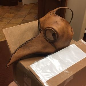 Tom banwell leather plague doctor mask.